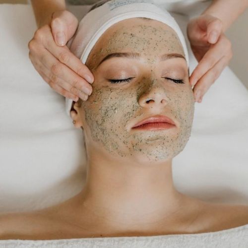 Facial pack applied to client's face at Lacey salon