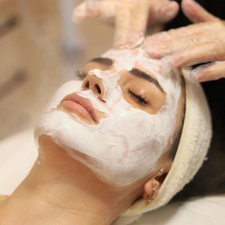 Facial pack being applied to our client by our trained professionals
